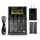 LiitoKala Lii-M4S 4-slot smart charger kit with US plug adapter and 4x 18650 flat top batteries. Includes touch control, 4 intelligent modes, and power bank function.