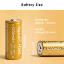 Vapcell 6200mAh 26650 battery powering a bright LED camping lantern on a picnic table at dusk.
