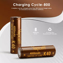 Vapcell K40 21700 flat top battery sitting perfectly in the tube of a high-power flashlight before tailcap closure.