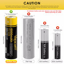 Vapcell P2160B 21700 battery inserted into an EDC flashlight next to a smartphone USB-C cable.