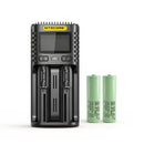 NITECORE UM2 dual-slot LCD smart charger with 2x Samsung 25R Button Top 18650 batteries – high-drain power kit with display.