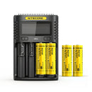 NITECORE UMS4 4-slot fast charger kit bundled with 4x NL2160 21700 6000mAh 8A high-capacity batteries for flashlights and outdoor gear. Batteries included.