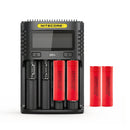 NITECORE UMS4 4-slot LCD smart charger with 4x LG HE2 2500mAh 20A flat top 18650 batteries – high-capacity power kit.