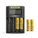 NITECORE UMS4 4-slot LCD smart charger with 4x LG HE4 2500mAh 20A flat top 18650 batteries – high-capacity power kit.