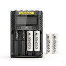 NITECORE UMS4 4-slot LCD smart charger with 4x Molicel P28A 2800mAh 35A flat top 18650 batteries – extreme high-drain power kit.