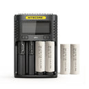 NITECORE UMS4 4-slot LCD smart charger with 4x Molicel P45B 4500mAh 45A 21700 flat top batteries – flagship extreme high-power kit.