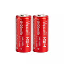 Two Vapcell K54 26650 5400mAh 15A NMC batteries lying on a carbon fiber background