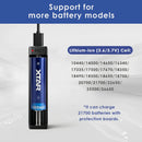 XTAR 21700 4900mAh 10A battery inserted into a high-lumen tactical flashlight, demonstrating the oversized 21700 form factor for extended outdoor illumination.
