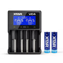 XTAR VC4 4-bay smart charger with 2600mAh 18650 button top battery