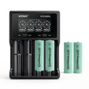 XTAR VC4SL 4-slot smart charger with 4x EVE 33V 3300mAh button top 18650 batteries – high-capacity long-run power kit.
