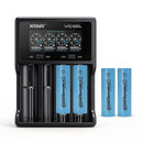 XTAR VC4SL 4-slot smart charger with 4x EVE 35V 3500mAh flat top 18650 batteries – reliable high-capacity power bundle.