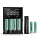 XTAR VC4SL 4-slot charger, MC1 single-slot charger, and 6x EVE 33V button top 18650 batteries – complete high-capacity long-run power kit.