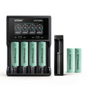 XTAR VC4SL 4-slot smart charger, MC1 single-slot USB charger, and 6x EVE 33V 3300mAh flat top 18650 batteries – high-capacity power bundle for EDC and camping.
